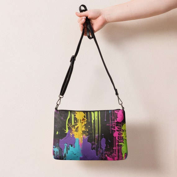 Graffiti clutch bag deals