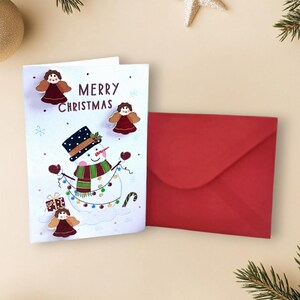 Witte showman kerstkaart voor je kerstversiering cadeau - Handgemaakte kerstpop-upkaart met engelenornamenten voor feestelijk kerstcadeau