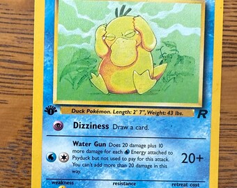 Pokemon First Edition Psyduck Team Ranger card 1999-2000 (Q)
