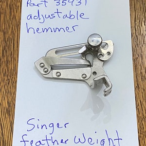 Singer accessory for featherweight adjustable hemmer , part 35931