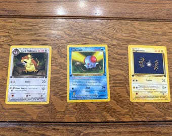 Pokemon First Edition Trading CardsLot of 3, 1999 and 1999-2000. Dark  Raticate, Tentacool and Magnemite,  (A)