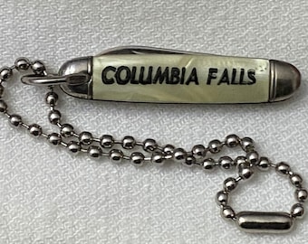 Vintage mother of pearl mini knife key chain advertisement