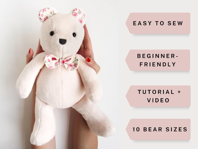 May include: A pink plush teddy bear with a floral bow tie. The bear is being held by a person's hands. The image includes text that says "Easy to Sew", "Beginner-Friendly", "Tutorial + Video", and "10 Bear Sizes".