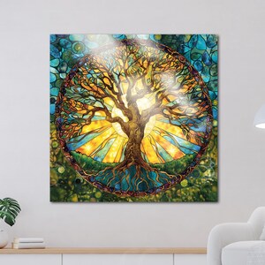 May include: A vibrant, stained-glass style artwork featuring a tree of life design. The tree has a brown trunk and branches, with a circular frame. The background is a mix of blues, greens, and yellows, creating a colorful and spiritual piece.