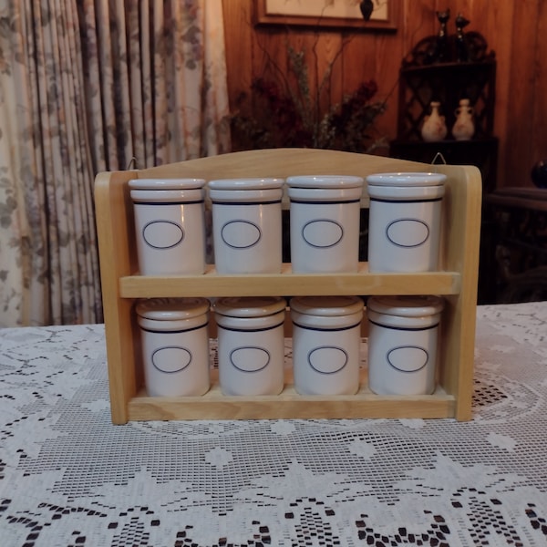 Vintage Dansk Ceramic 8 Crock Style Jars with Wooden Rack for Display and Storage Purposes