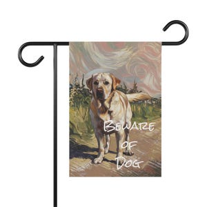 May include: A garden flag with a painted image of a yellow Labrador Retriever standing on a path. The text "Beware of Dog" is written in white on the flag.