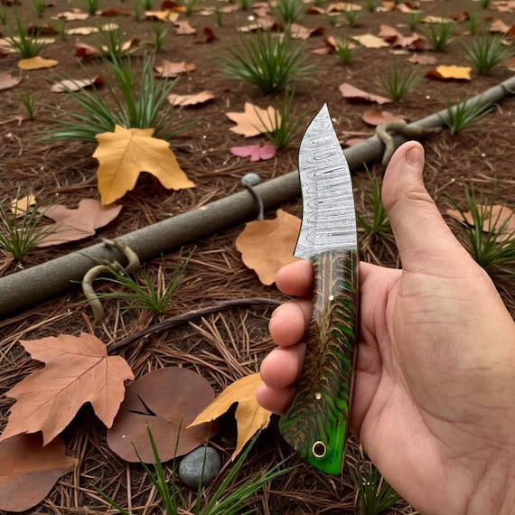 Damascus Steel Hunting Knife: 9” Overall Length, Green Pinecone Handle, Unique Colors, Leather Sheath. It’s Very Unique and a Beauty!
