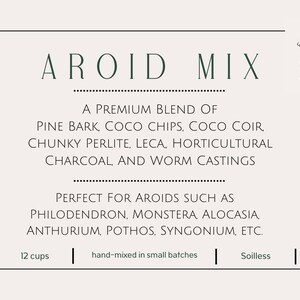 May include: A white label with black text and a green leaf design. The label reads "AROID MIX" and describes a premium blend of soil for aroids, including pine bark, coco chips, coco coir, perlite, LECA, horticultural charcoal, and worm castings. The label also lists the plants this soil is perfect for, including philodendron, monstera, alocasia, anthurium, pothos, syngonium, and more. The label states that the soil is hand-mixed in small batches and is soilless. It also states that the soil comes in 12 cups.