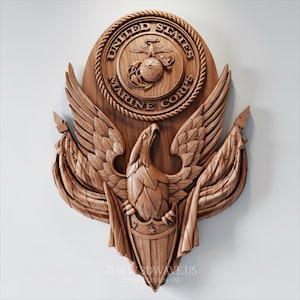 May include: A wooden relief carving of the United States Marine Corps emblem. The emblem features an eagle with outstretched wings, a globe, and the words "United States Marine Corps" in a circular design. The carving is in shades of brown.