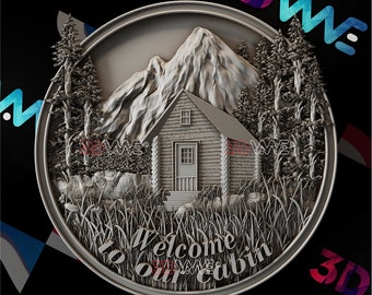 May include: A detailed, circular relief sculpture featuring a cabin nestled at the base of a mountain, surrounded by trees and tall grass. The words "Welcome to our cabin" are inscribed at the bottom. The design is rendered in a neutral, monochromatic color scheme.