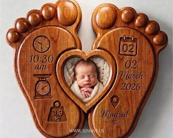 May include: A wooden plaque shaped like two baby feet with a central heart-shaped cutout containing a photograph of a newborn. Engraved details include a clock showing 10:30 am, a scale icon with 3.9 kg, a calendar showing 02 March 2026, and Madrid.