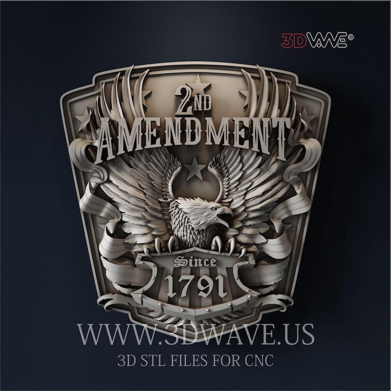 May include: A silver-colored, shield-shaped emblem with the words "2ND AMENDMENT" and "Since 1791." The design features an eagle with outstretched wings, a star, and decorative ribbons. The website address "WWW.3DWAVE.US" is also visible.