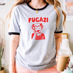 Camiseta FUGAZI Ringer con diseño retro icónico unisex en 8 combinaciones de colores, camiseta vintage de banda, ropa punk rock, merchandising de música alternativa, retro