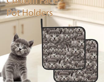 Puede incluir: Dos agarraderas de olla grises y negras con un patrón de muchas caras de gato. El texto "Custom Face Pot Holders" es visible en la parte superior de la imagen.