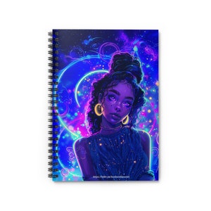 May include: Spiral-bound notebook featuring a vibrant illustration of a woman with purple skin, gold hoop earrings, and a blue top. The background is a neon-style design with blue and pink hues. The notebook has a white cover and a black spiral binding.