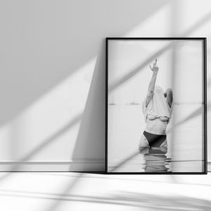 Striking black and white photography print featuring rebellious feminine energy. A bold and edgy feminist art piece, perfect for modern wall decor. Unique aesthetic gift for her, ideal for home, bedroom, or office. High-quality minimalist artwork for those who embrace fearless expression.