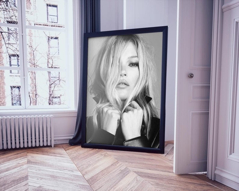 Vintage Kate Moss canvas poster featuring her iconic pose. A perfect addition to any 90s fashion lovers decor, black and white photography style for a retro, chic vibe. Ideal for celebrity wall art enthusiasts and retro home decor. Vintage Fashion