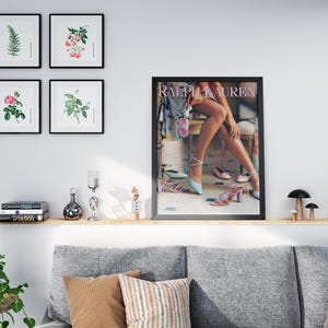 Vintage fashion magazine style wall art with floral dress imagery and sophisticated details.