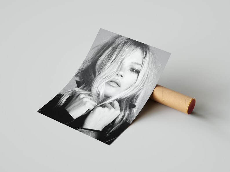 Vintage Kate Moss canvas poster featuring her iconic pose. A perfect addition to any 90s fashion lovers decor, black and white photography style for a retro, chic vibe. Ideal for celebrity wall art enthusiasts and retro home decor. Vintage Fashion