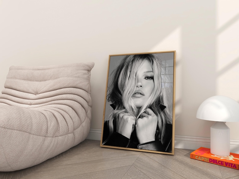 Vintage Kate Moss canvas poster featuring her iconic pose. A perfect addition to any 90s fashion lovers decor, black and white photography style for a retro, chic vibe. Ideal for celebrity wall art enthusiasts and retro home decor. Vintage Fashion