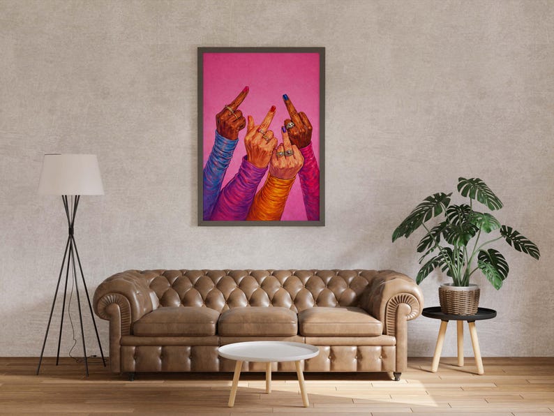 Female empowerment wall art with raised hands and vibrant nail polish