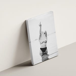 Striking black and white photography print featuring rebellious feminine energy. A bold and edgy feminist art piece, perfect for modern wall decor. Unique aesthetic gift for her, ideal for home, bedroom, or office. High-quality minimalist artwork for those who embrace fearless expression.