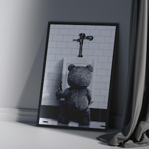 Humorous wall art showing a teddy bear with a beer, perfect for bar or restroom decor.