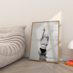 Striking black and white photography print featuring rebellious feminine energy. A bold and edgy feminist art piece, perfect for modern wall decor. Unique aesthetic gift for her, ideal for home, bedroom, or office. High-quality minimalist artwork for those who embrace fearless expression.
