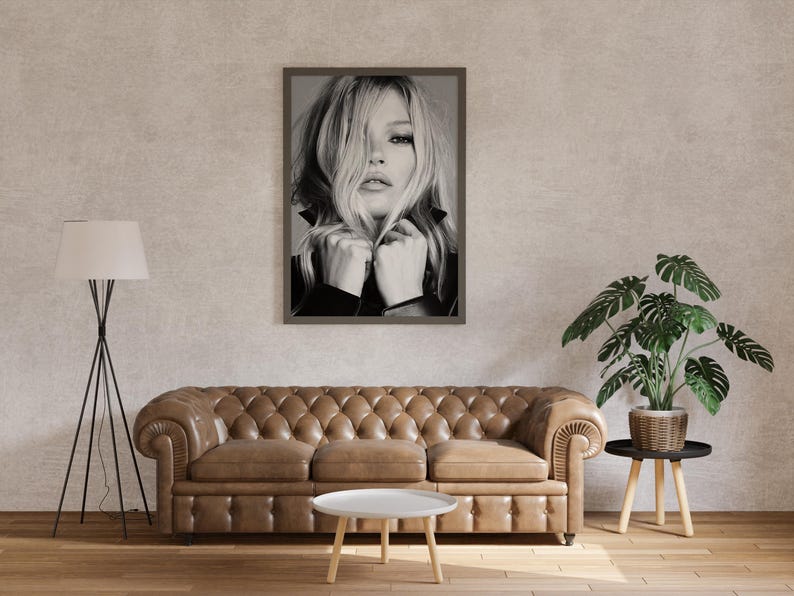 Vintage Kate Moss canvas poster featuring her iconic pose. A perfect addition to any 90s fashion lovers decor, black and white photography style for a retro, chic vibe. Ideal for celebrity wall art enthusiasts and retro home decor. Vintage Fashion