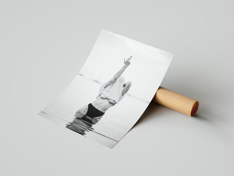 Striking black and white photography print featuring rebellious feminine energy. A bold and edgy feminist art piece, perfect for modern wall decor. Unique aesthetic gift for her, ideal for home, bedroom, or office. High-quality minimalist artwork for those who embrace fearless expression.