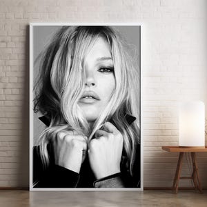 Vintage Kate Moss canvas poster featuring her iconic pose. A perfect addition to any 90s fashion lovers decor, black and white photography style for a retro, chic vibe. Ideal for celebrity wall art enthusiasts and retro home decor. Vintage Fashion