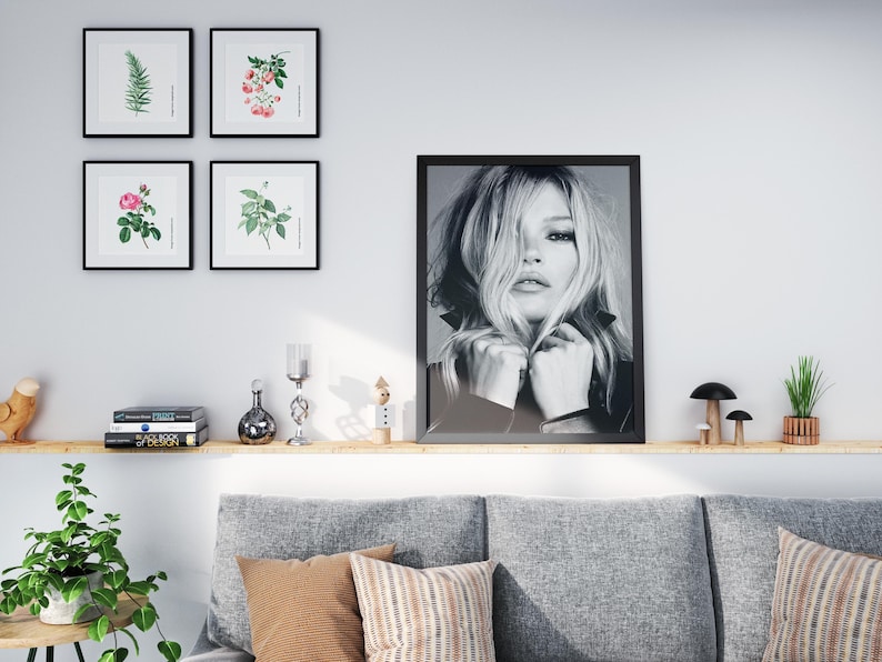 Vintage Kate Moss canvas poster featuring her iconic pose. A perfect addition to any 90s fashion lovers decor, black and white photography style for a retro, chic vibe. Ideal for celebrity wall art enthusiasts and retro home decor. Vintage Fashion