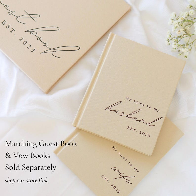 May include: Beige guest book and vow books with black script. The guest book reads "Guest Book EST. 2025". The vow books say "My vows to my husband EST. 2025" and "My vows to my wife EST. 2025".