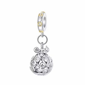 May include: A silver charm bead featuring a spherical pendant with a swirling, flame-like embossed pattern. The charm is attached to a cylindrical bail decorated with small, circular gold-toned accents around its outer edge.