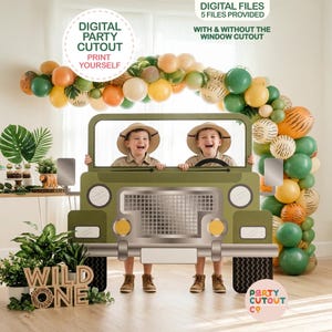 May include: A green cardboard jeep cutout with two children wearing safari hats. The jeep is decorated with silver accents and has a tire design. A balloon arch in orange, green, and brown colors frames the top. The text "DIGITAL PARTY CUTOUT" and "WILD ONE" are visible.