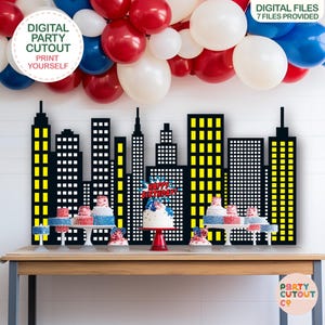 May include: A party scene with a cityscape backdrop, balloons, and a table with cakes and cupcakes. The cityscape is black with yellow windows. The balloons are red, white, and blue. The cakes have red, white, and blue decorations. Text on the image says "DIGITAL PARTY CUTOUT PRINT YOURSELF".