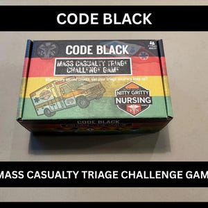 May include: A boxed game titled "CODE BLACK" with the subtitle "MASS CASUALTY TRIAGE CHALLENGE GAME." The box features an ambulance graphic and the text "NITTY GRITTY NURSING." The box has a black top and bottom with red, yellow, green, and black stripes.