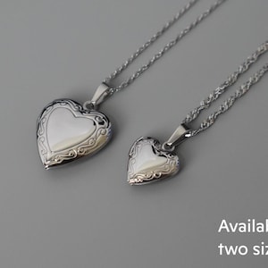 a couple of necklaces that are on a table