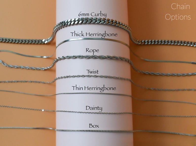 a variety of metal chain necklaces with different thicknesses and designs, arranged in a column on a white background.