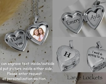 May include: A silver-coloured heart-shaped locket pendant on a chain. The locket opens to reveal custom photo inserts and engraved text including 'I Love You', 'Emery', 'Ayla', and 'I would do anything for you'. The exterior features an engraved letter H.
