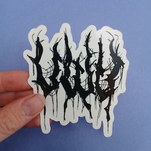 May include: Black and white sticker with the word "GRUESOME" written in a stylized, dripping font.