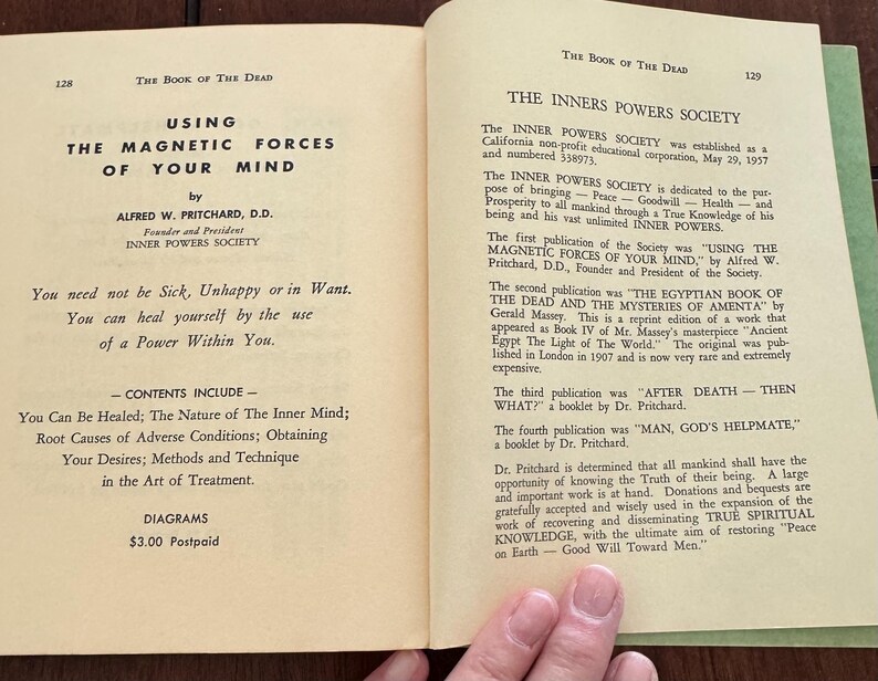 May include: Open book pages with text from "The Book of the Dead" by Alfred W. Pritchard. The left page features the title "Using the Magnetic Forces of Your Mind" and a list of contents. The right page details "The Inners Powers Society".