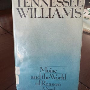 May include: A vintage book titled "Moise and the World of Reason: A Novel" by Tennessee Williams. The book cover has a gradient blue and white background with black text. The book is in good condition.