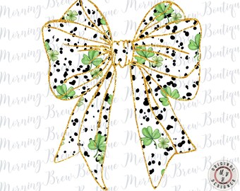 May include: A white and black polka dot bow with gold glitter and green shamrock accents. The bow is tied in a knot and has a gold outline.