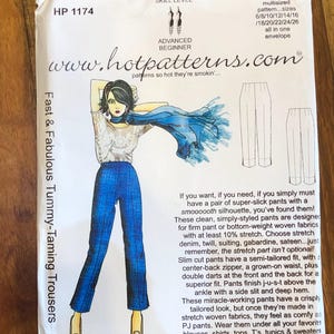 May include: A sewing pattern for a pair of pants with a smooth silhouette. The pattern is for sizes 6-26 and includes instructions for making the pants. The pattern is from Hot Patterns and is called "Fast & Fabulous Tummy-Taming Trousers".