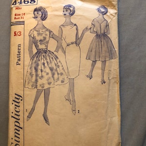 May include: Vintage Simplicity sewing pattern number 4468 for a dress. The pattern is for a size 14, bust 34. The pattern shows three different views of the dress, one with a floral print, one with a solid colour, and one with a skirt.