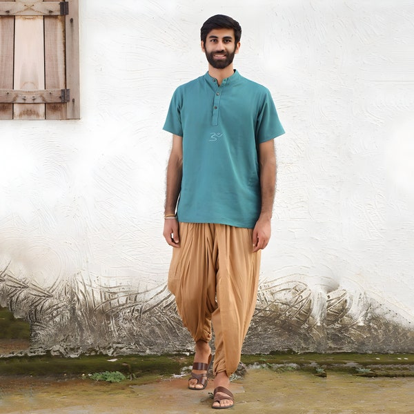 Men’s 100% organic cotton kurta with embroidered (Teal) "Aum". Short sleeved short kurta. Relaxed fit. GOTS Certified