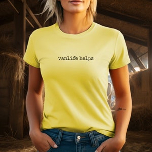 May include: A yellow t-shirt with the text "vanlife helps" printed on the front.