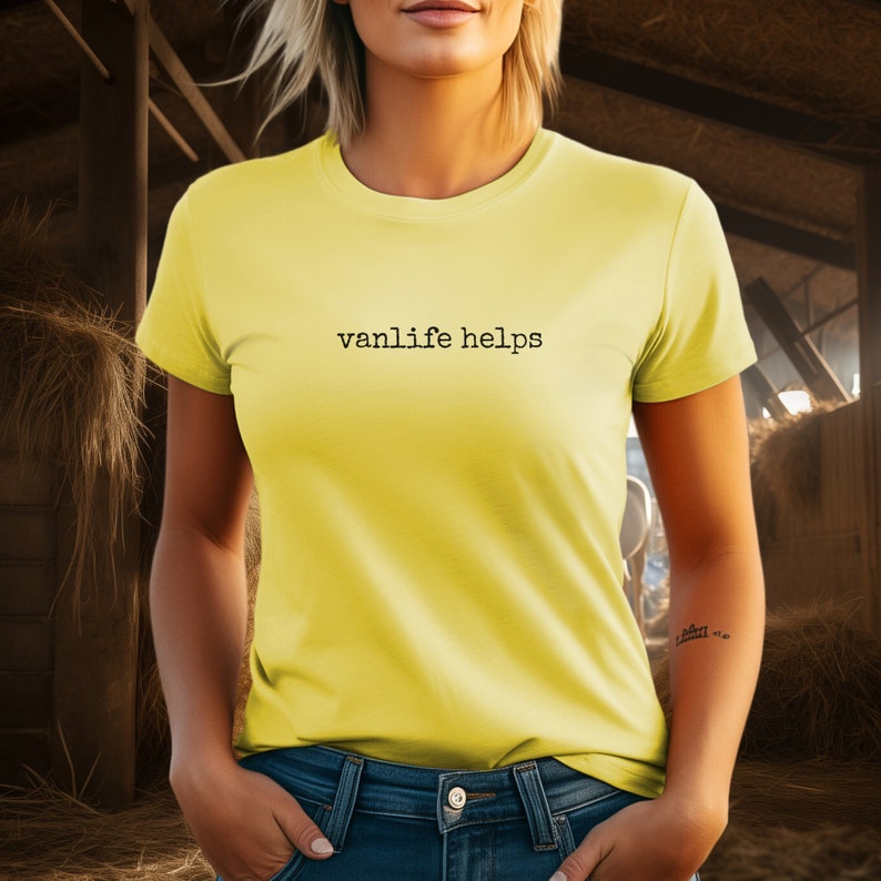 May include: A yellow t-shirt with the text "vanlife helps" printed on the front.