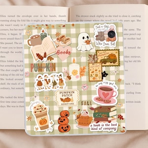 May include: A square tablet case with a light green and white gingham pattern, covered in various fall-themed stickers including pumpkins, ghosts, books, coffee cups, and text such as "Just a Girl Who Loves Fall" and "a book is the best kind of company."